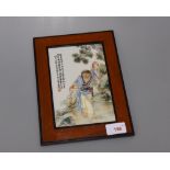 A Chinese porcelain famille rose plaque mounted in a wooden frame decorated with Liu Hai and the