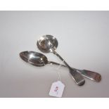 A Victorian silver fiddle pattern serving spoon, London 1863, tog with a similar patterned sauce