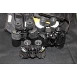 A group of four binoculars inc. Regent