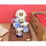 A tray inc. a Staffordshire mantel clock, Gaudy ware jug, 19th century jug etc