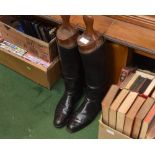 A pair of black leather gentlemen's riding boots with trees