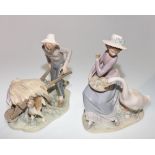 A Lladro porcelain figure of a boy with a wheelbarrow and dog together with a Lladro figure of a