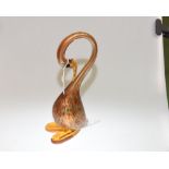 An Italian glass swan model in ambers, reds and greens, 31cm high