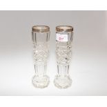 A pair of silver mounted cut glass bud vases,