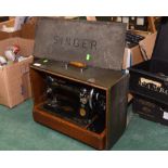 A vintage cased Singer sewing machine