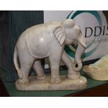 A substantial marble Indian elephant