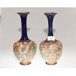 A matched pair of Royal Doulton Slater stoneware vases, circa 1910, 27cm high, with impressed