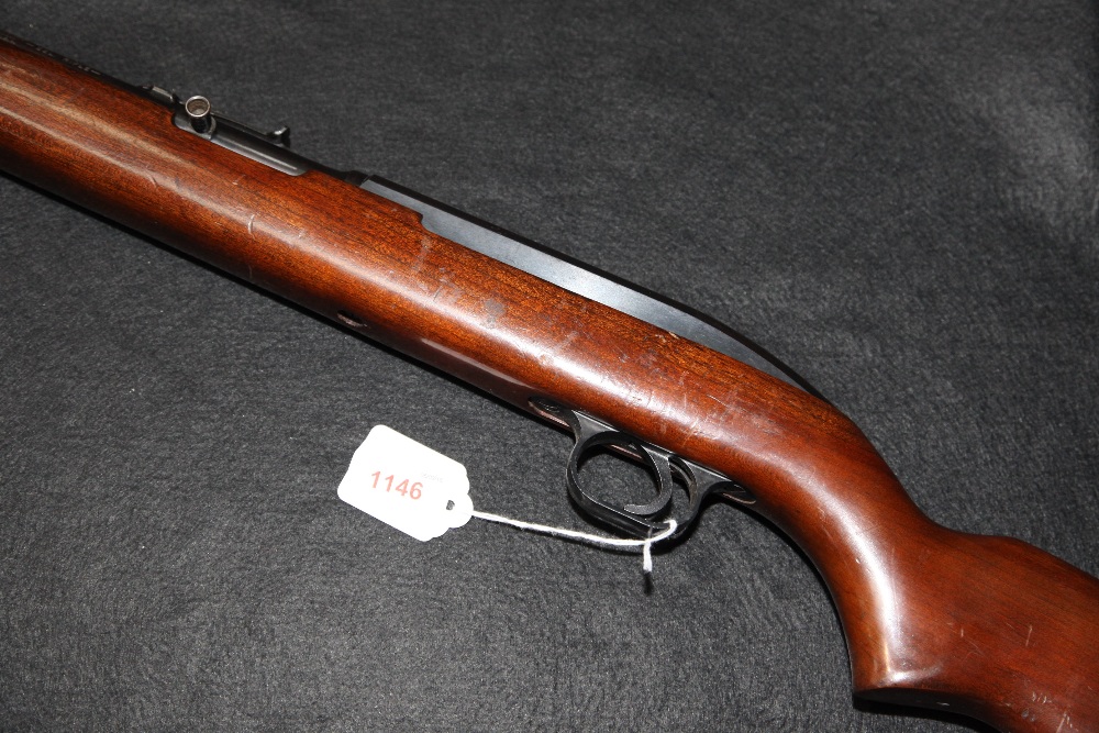 SECTION 1: a Winchester .22 long rifle, rim fire model 77, Semi-automatic rifle with tubular