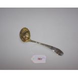 A George II silver sifting spoon with gilt bowl, London 1744. 1.3 troy ounces