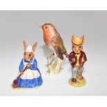 A Goebel porcelain figure of a Robin, together with two Royal Doulton figures of Mr & Mrs