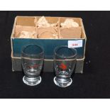 A set of six drinking glasses each painted with a fishing fly