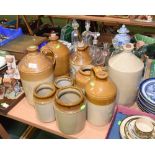 A quantity of vintage stoneware jugs, jars and flagons inc. Fentiman's, H Churchman wine and