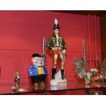 A large 'Irish Mist'  military porcelain advertising figure together with a Toby jug (2)