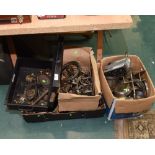 A box of trade furniture inc. candle arms, teapot stands, door handles etc