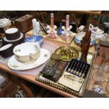 Two trays inc. silver plate coffee spoons, brass weights and scales, Chinese carved rootwood figure,