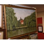 Michael Doughty, a lake with church beyond, signed, framed