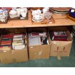 Three boxes containing a large quantity of books on art reference, novels etc