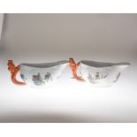 A pair of Chinese porcelain sauceboats (a/f)