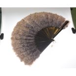 An ebony and grey feather fan