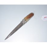 A Chinese paper knife with green hardstone handle and engraved blade, possibly 19th century.