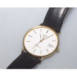 A gentleman's Longines 9ct gold cased wristwatch, the white enamel dial inscribed Presence, with