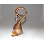 An Italian glass swan model in ambers, reds and greens, 31cm high