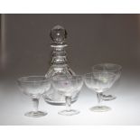 A Stuart cut glass decanter and stopper and four wine glasses (5)