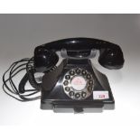 A Vintage style black bakelite telephone