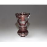 A 19th century Bohemian red flash glass vase, etched with deer and a rococo cartouche. 14cm