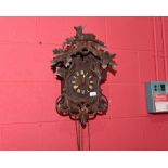 A vintage cuckoo clock in the Blackforest taste