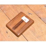 A small wooden cigar case with hinged cover