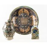 A MOROCCAN 'SAVI' BOWL, A MOROCCAN METAL MOUNTED 'FEZ' JAR AND COVER and a PERSIAN QAJAR OIL JAR (3)