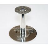 A TUDRIC PEWTER LIBERTY & Co. CANDLESTICK BY ARCHIBALD KNOX, the drop in drip tray with Celtic