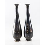 A PAIR OF JAPANESE MIXED METALS INLAID BRONZE VASES, MEIJI PERIOD, of slender tapering form,