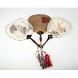 TWO EARLY 20th CENTURY ORIENTAL PADDLE SHAPED FANS with gilt decorated handles; together with A