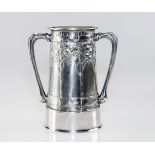 A LIBERTY & Co. PEWTER LOVING CUP BY DAVID VEASEY, decorated with stylised trees and the motto "