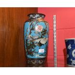 A tall late 19th/early 20th Century Chinese cloisonne vase decorated with two panels with cranes
