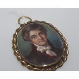 A 19th century portrait miniature of a gentleman on ivory in gilt metal frame with an attractive