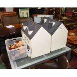 Two painted wooden doll's houses; tog. with a quantity of doll's house furniture