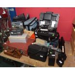 A large quantity of photographic and camera equipment inc. vintage 8mm cameras, tripods, audio