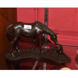 A Heredities bronzed resin figure of a mare and foal