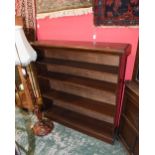 An oak open bookcase; tog. with a standard lamp