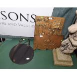 A cast iron skillet; tog, with an Art Nouveau brass fire plaque and brass wall hanging