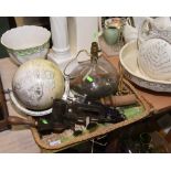 A tray inc. a vintage mincer, a glass table lamp and a table globe