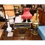 An alabaster table lamp, a brass table lamp and a brass magazine rack (3)