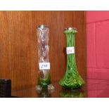 An iridescent green glass vase with silver plated mount together with a green cut glass vase (2)