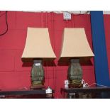 A pair of Oriental bronze vases, later mounted as table lamps