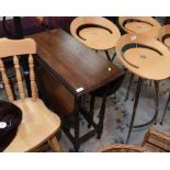 A 19th century oak dropleaf table