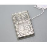 A silver Zippo style lighter, with engine turned decoration and stamped silver.