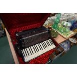 A vintage Italian piano accordion, Italia Cooperativa Stradella... De Luxe, cased